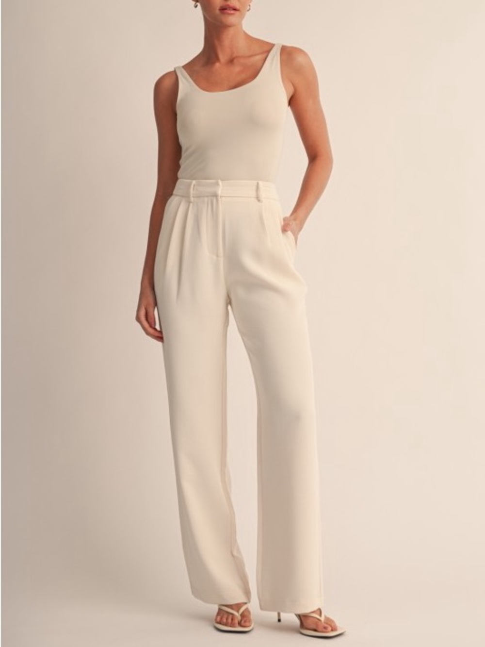 High-Rise Wide-Leg Trousers in Cream